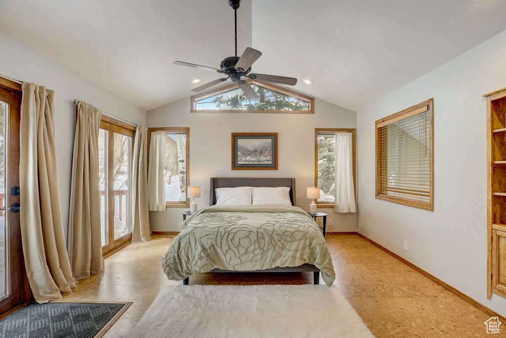 Bedroom featuring vaulted ceiling and ceiling fan