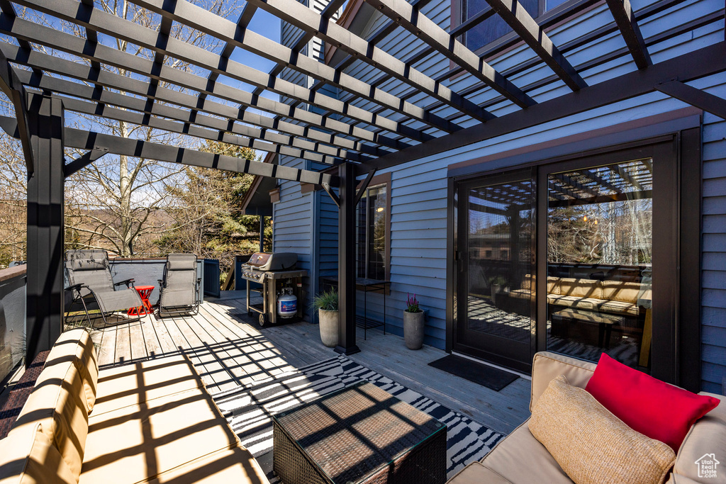 View of patio / terrace featuring a pergola, a grill, and an outdoor hangout area