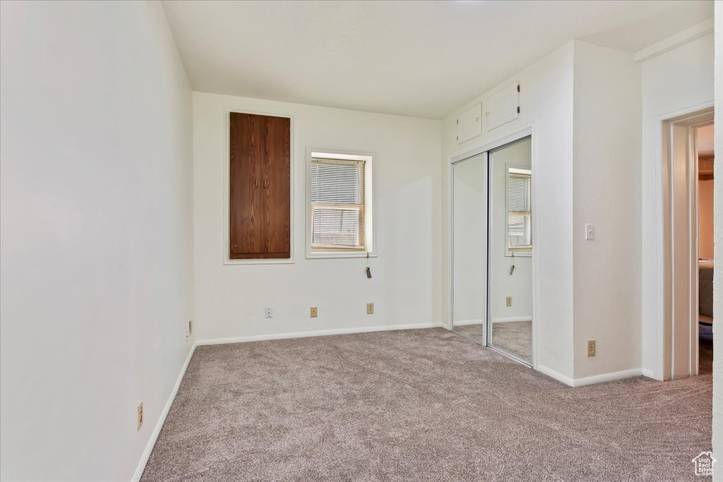Interior space featuring carpet flooring