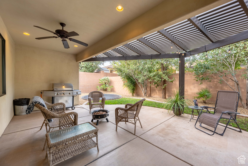 View of patio / terrace featuring ceiling fan, a grill, and a pergola