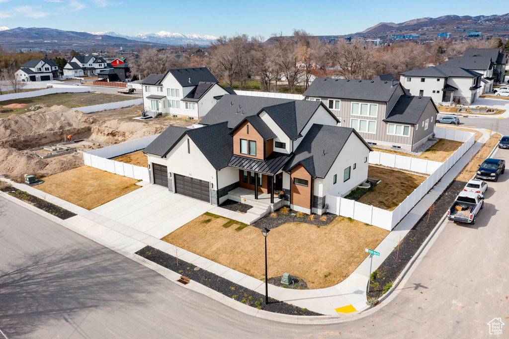 Birds eye view of property with a mountain view