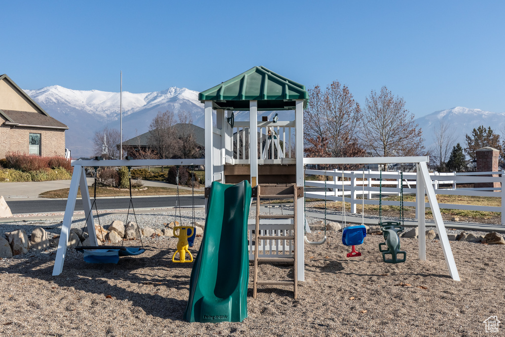 View of play area with a mountain view
