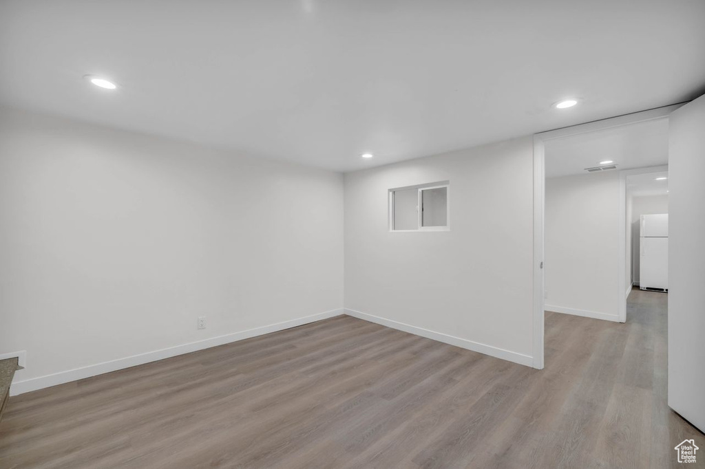 Empty room with wood-type flooring