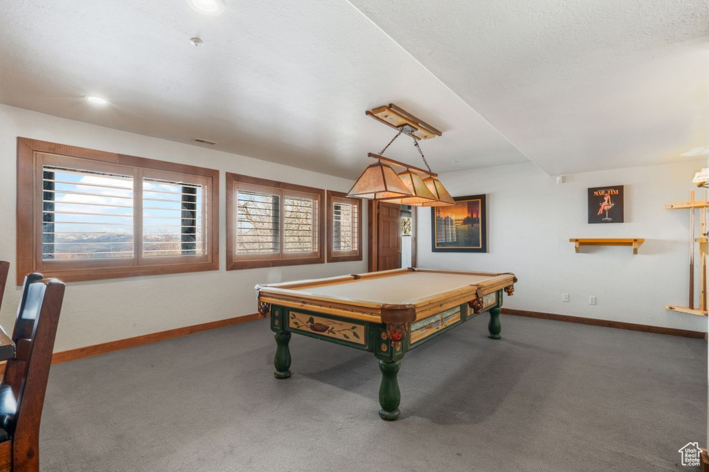 Game room with carpet floors and billiards
