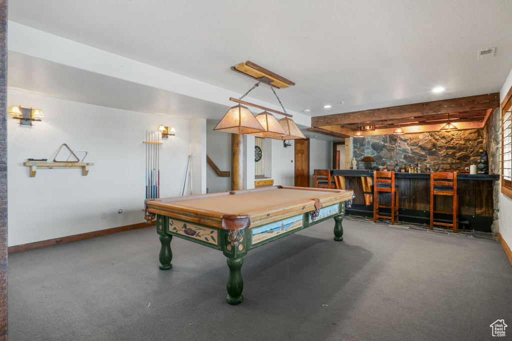 Game room featuring pool table and bar area