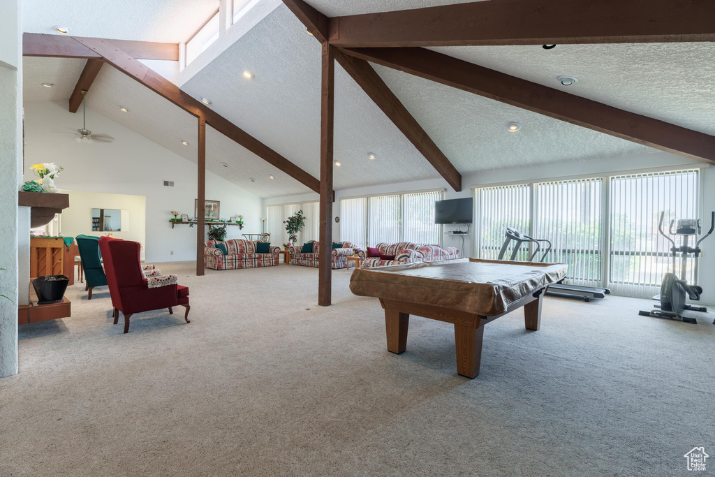 Playroom featuring high vaulted ceiling, beam ceiling, carpet flooring, and billiards