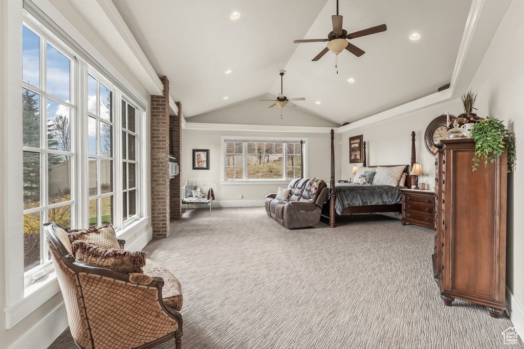 Bedroom featuring brick wall, carpet, ceiling fan, and lofted ceiling
