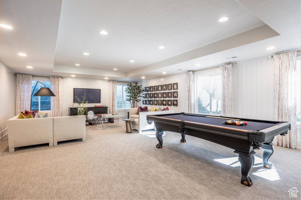 Recreation room with carpet flooring, pool table, and a raised ceiling