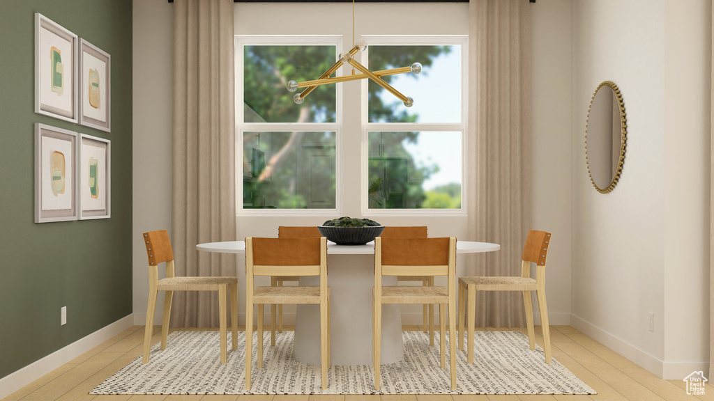 Dining room with hardwood / wood-style floors and plenty of natural light