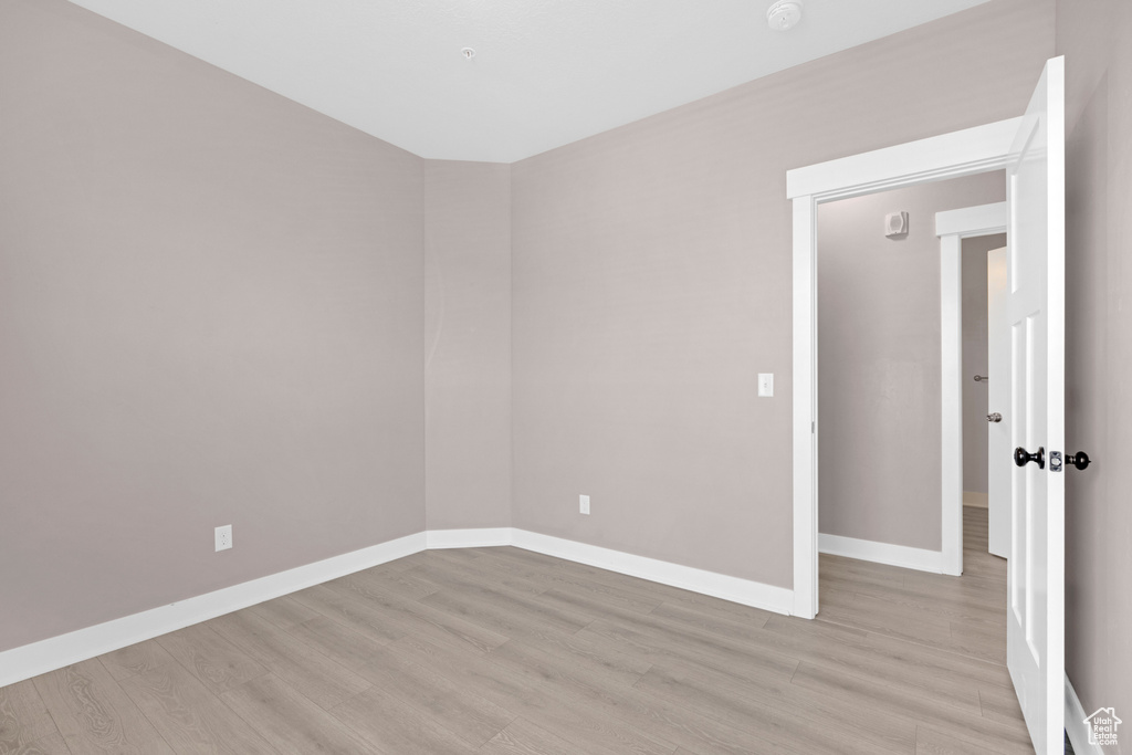 Spare room with light hardwood / wood-style flooring