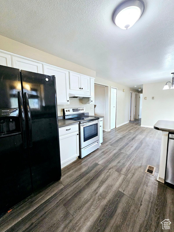 Kitchen with white cabinetry, dark hardwood / wood-style floors, black fridge with ice dispenser, stainless steel dishwasher, and electric range