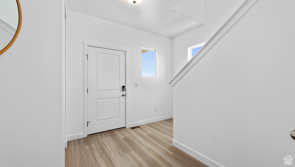 Foyer featuring light hardwood / wood-style flooring