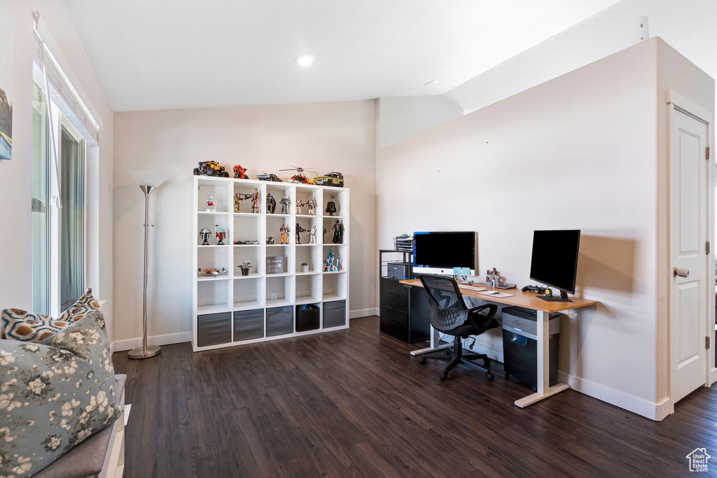 Office featuring dark hardwood / wood-style floors and vaulted ceiling