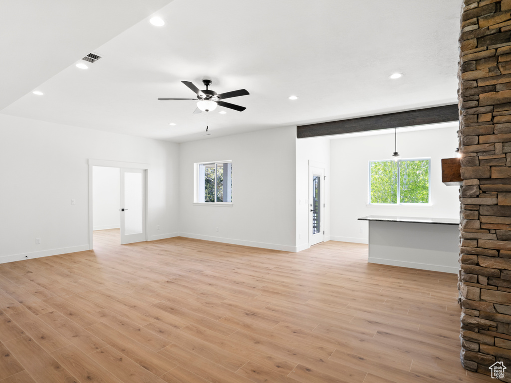 Spare room featuring light hardwood / wood-style flooring and ceiling fan