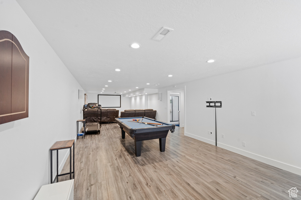 Rec room featuring light wood-type flooring and billiards