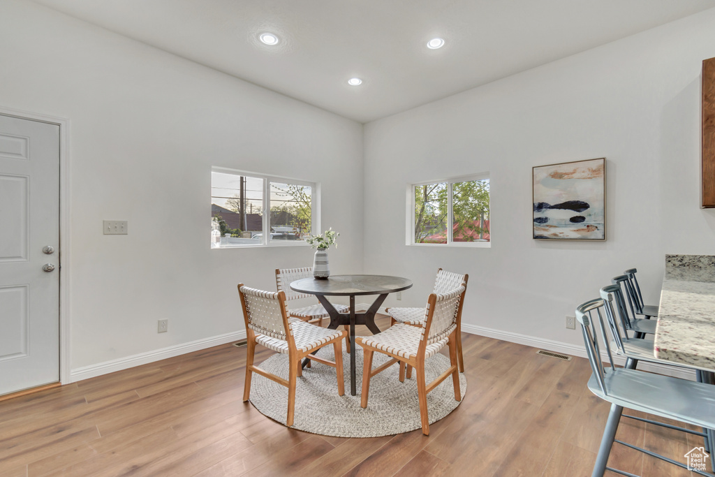 Dining room featuring plenty of natural light and light wood-type flooring