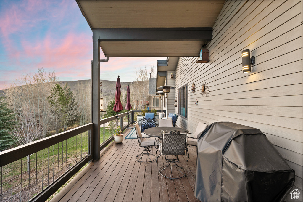 Deck at dusk with grilling area