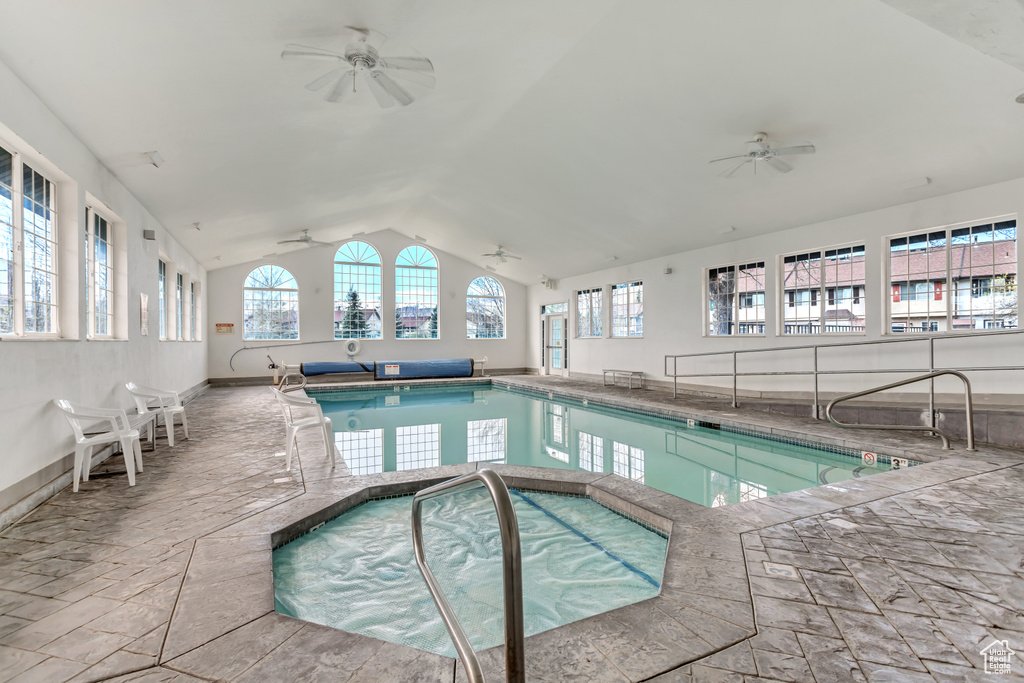 View of pool with ceiling fan