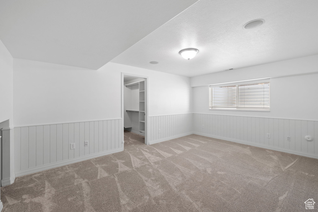 Unfurnished room featuring carpet floors