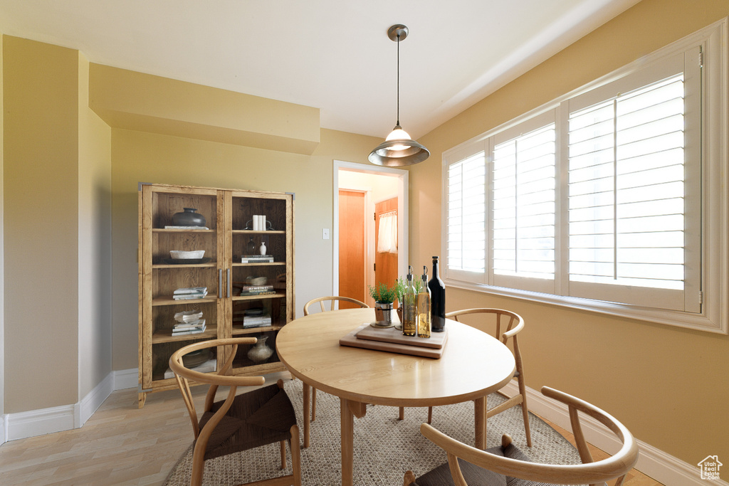 Dining room featuring light wood-type flooring