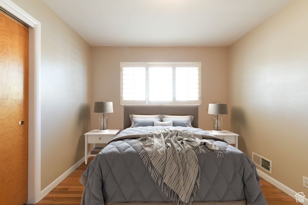 Bedroom featuring hardwood / wood-style flooring