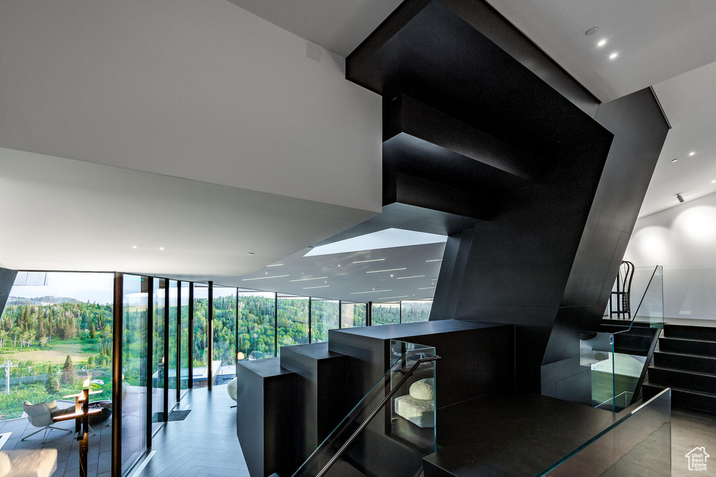 Stairway featuring expansive windows