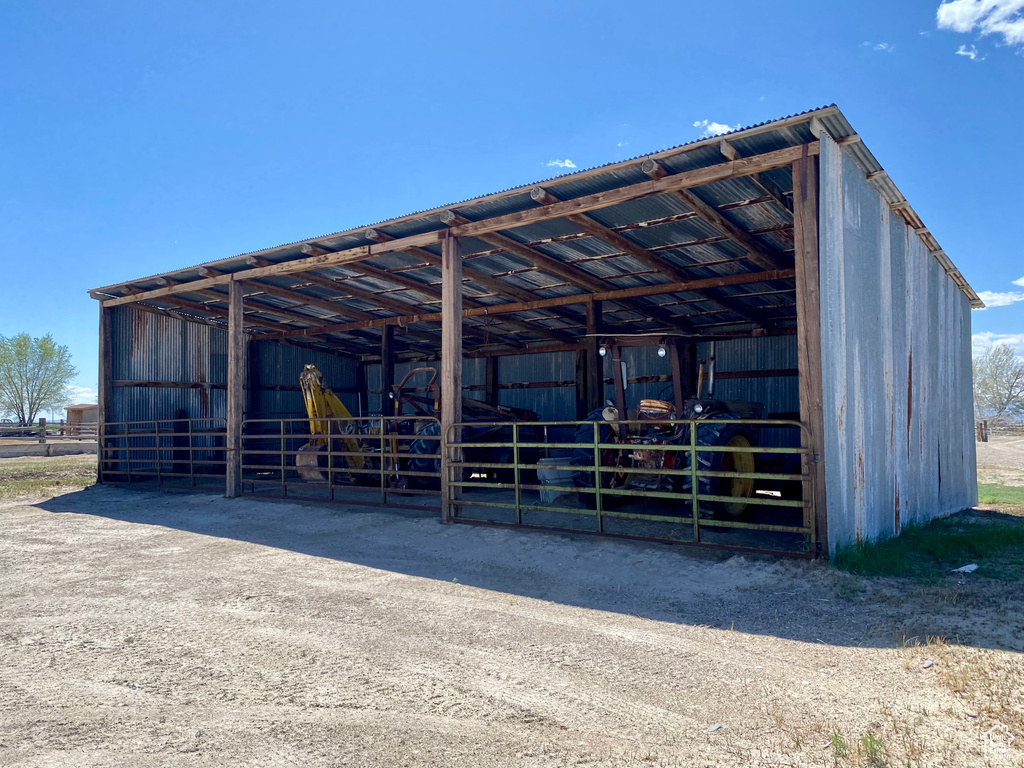 View of horse barn featuring an outdoor structure