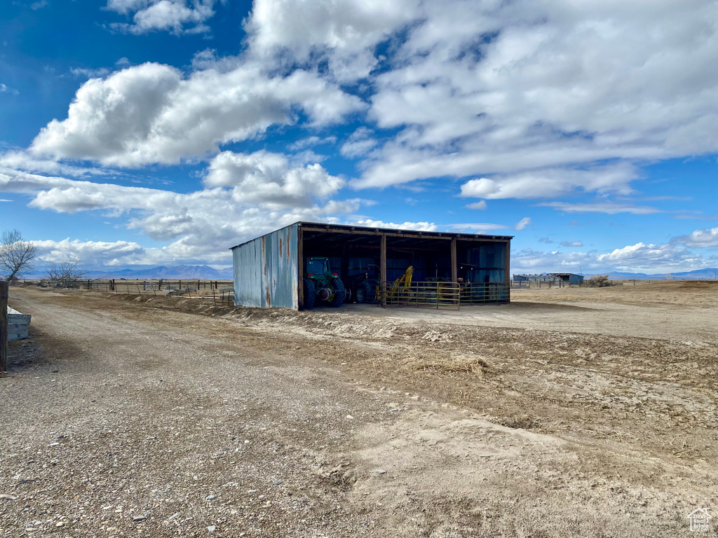 View of outdoor structure featuring a rural view