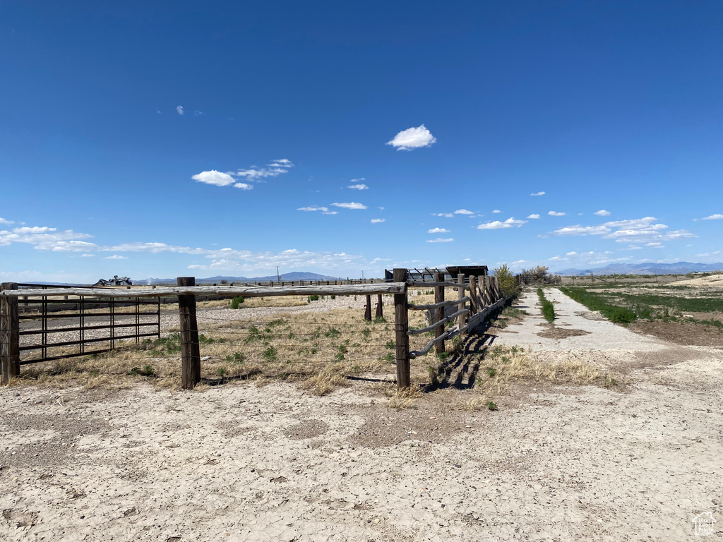 View of yard with a rural view