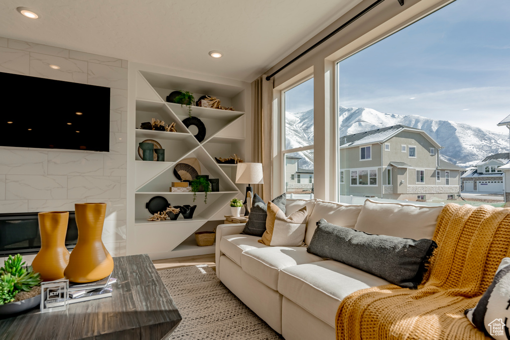 Living room with a mountain view and built in features