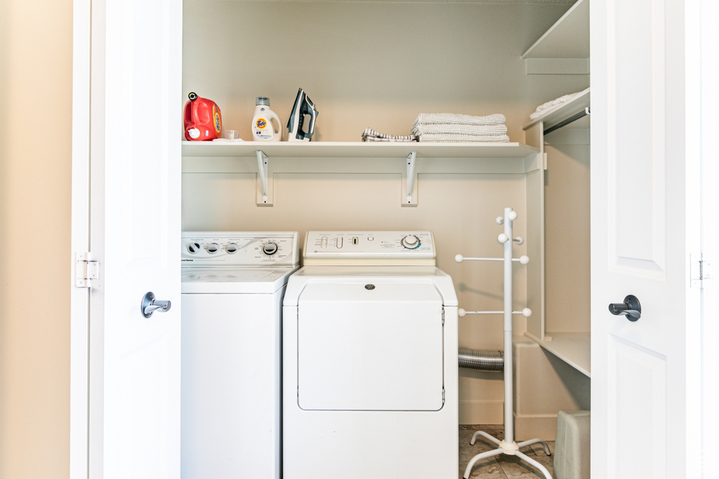 Clothes washing area with washer and dryer