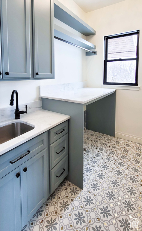 Laundry area featuring sink