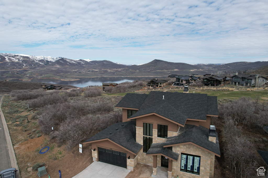 Property view of mountains featuring a water view