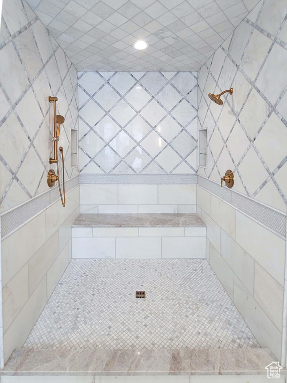 Bathroom featuring tiled shower