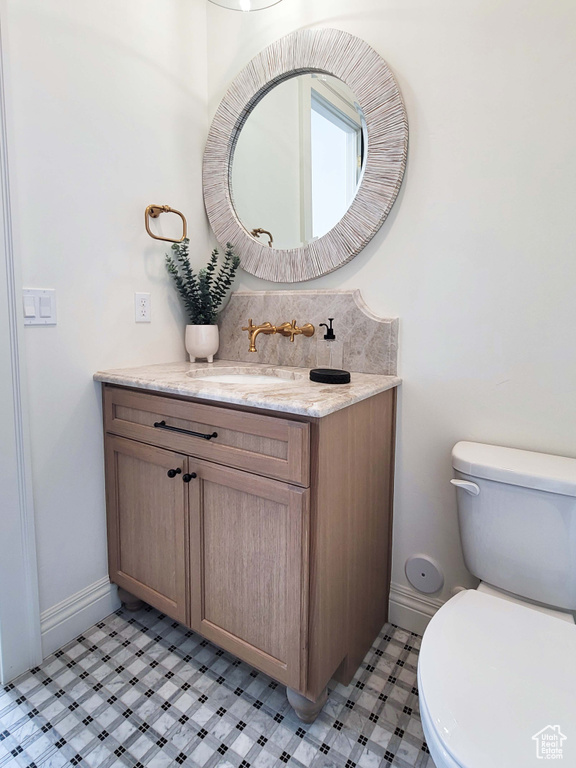 Bathroom featuring toilet and vanity