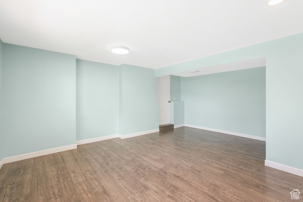 Unfurnished room with wood-type flooring