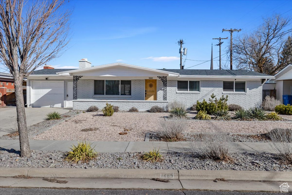 Ranch-style home with a garage