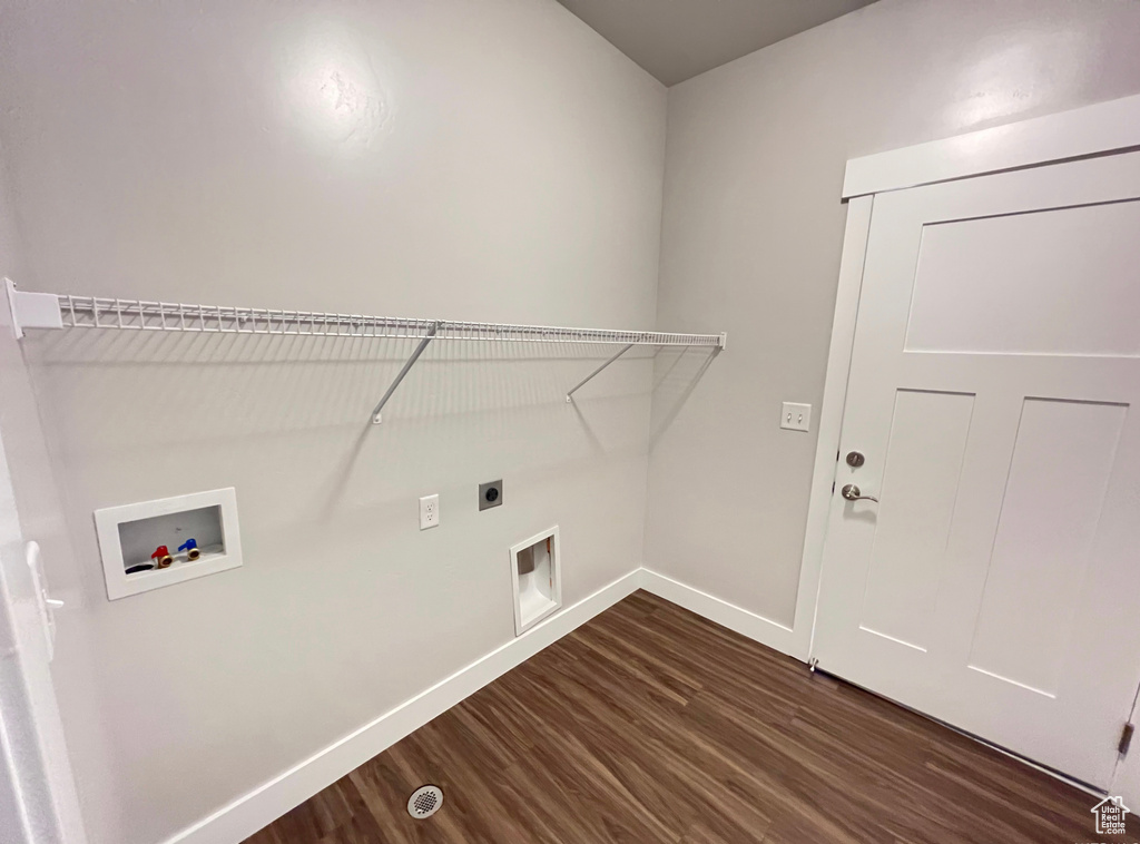 Laundry room with washer hookup, hookup for an electric dryer, and dark hardwood / wood-style floors