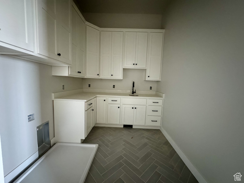 Laundry room with sink