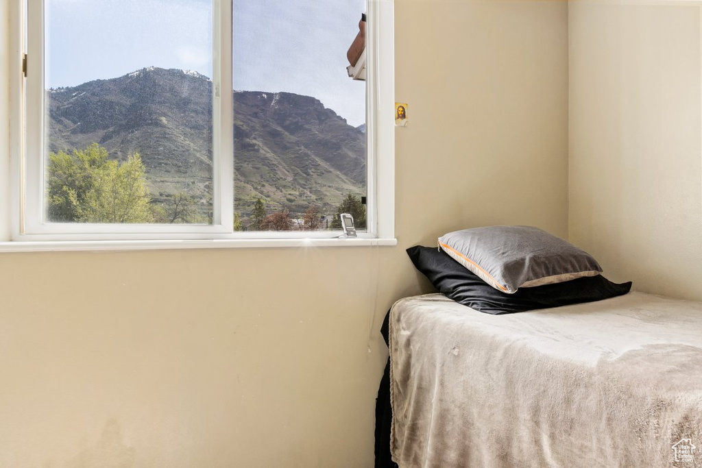 Bedroom with a mountain view