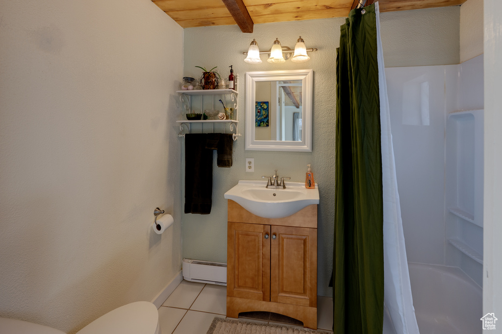 Full bathroom featuring wood ceiling, tile floors, toilet, vanity, and baseboard heating