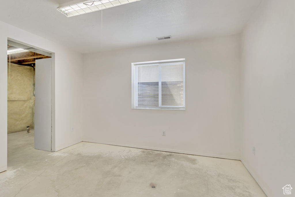 Empty room with concrete floors