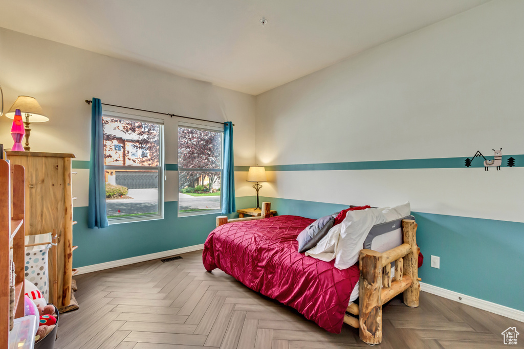 Bedroom featuring parquet floors
