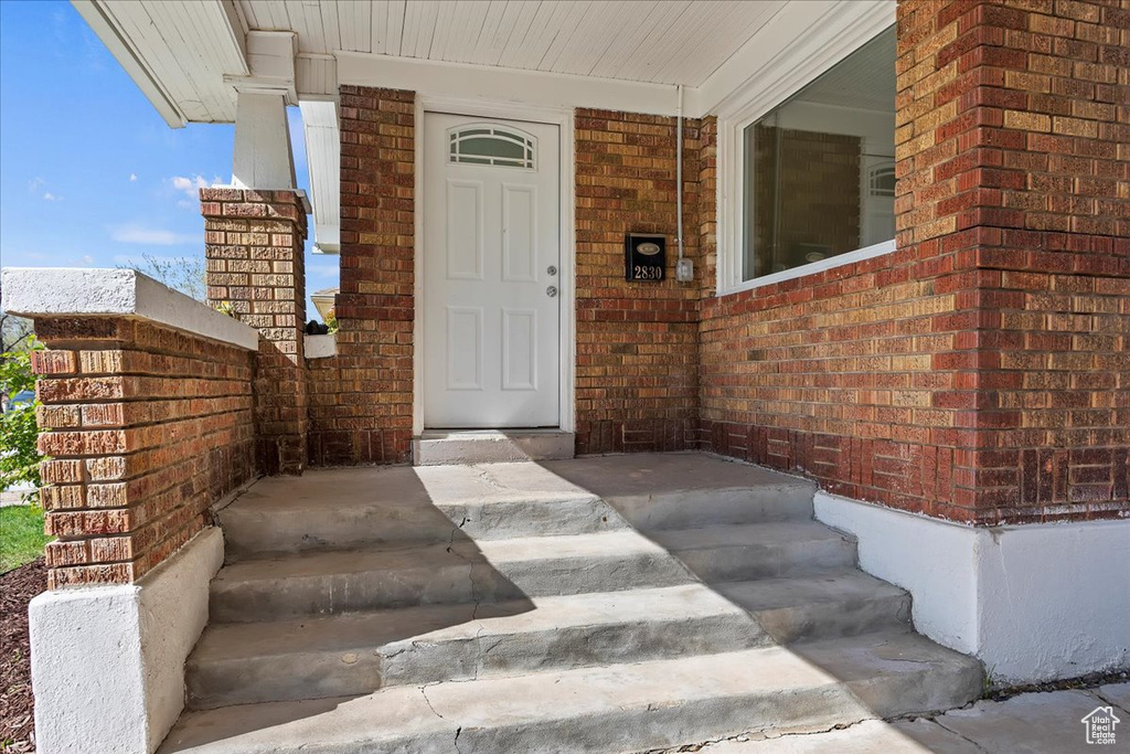 Property entrance featuring a porch