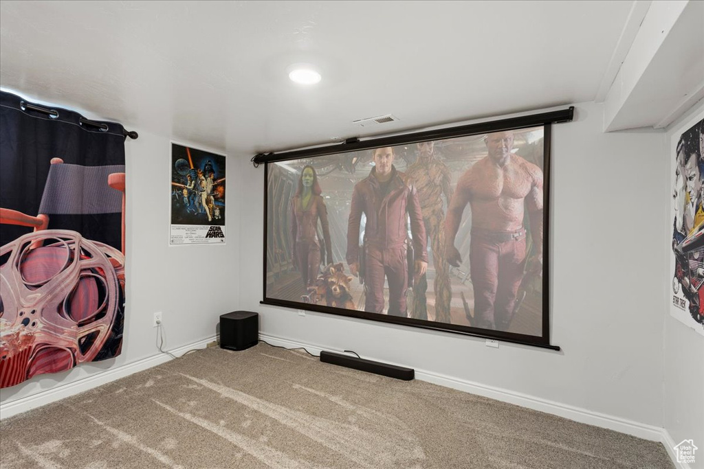 Home theater featuring carpet floors
