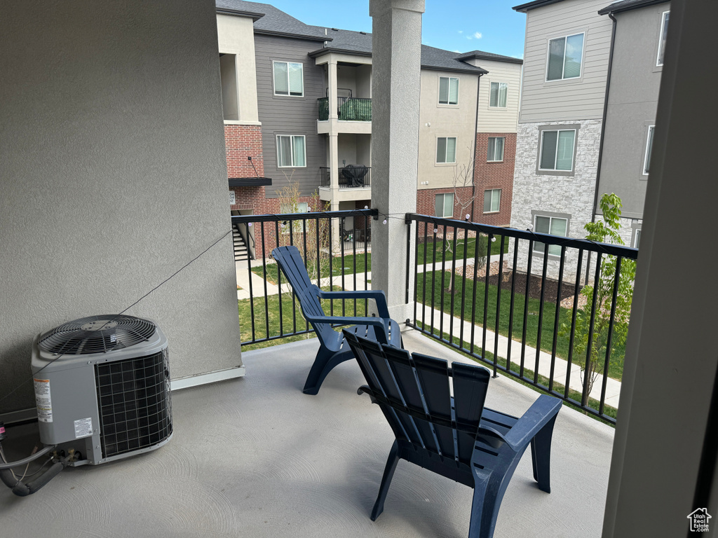 Balcony featuring central AC unit