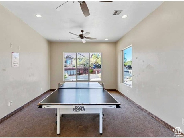 Game room featuring ceiling fan and carpet flooring