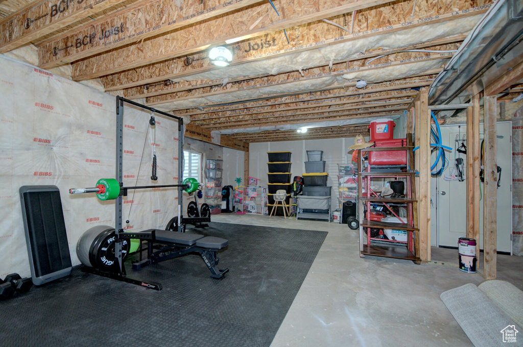 Workout area featuring concrete flooring