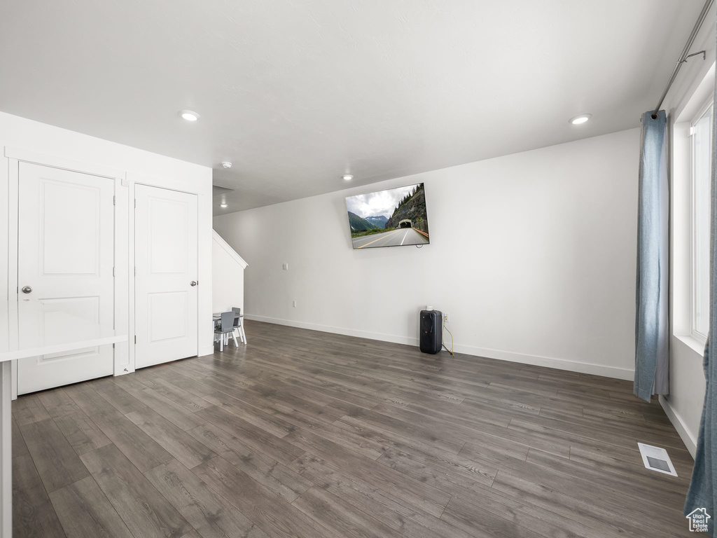 Interior space featuring dark hardwood / wood-style floors