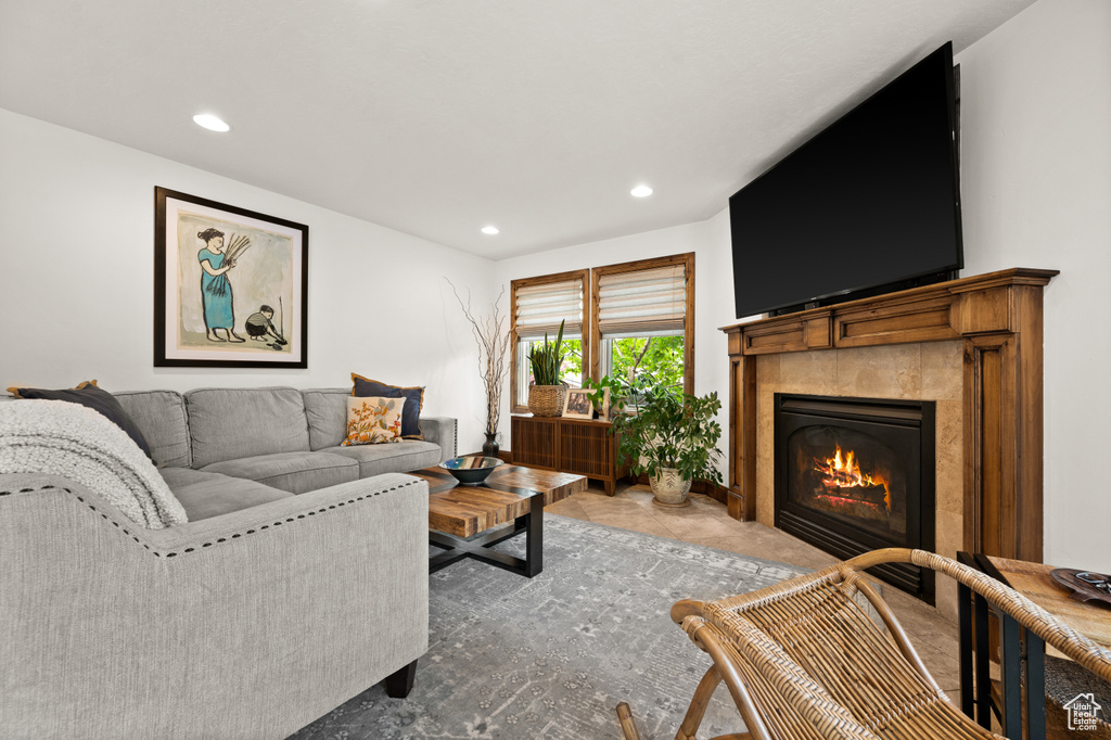 Living room with a tile fireplace